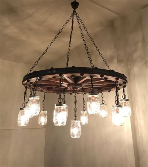Check spelling or type a new query. Image result for wagon wheel chandelier | Wheel decor, Wagon wheel decor, Mason jar chandelier