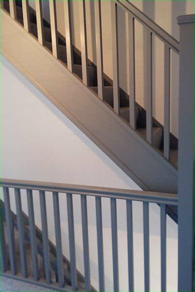 The handrail on the side of a staircase. Case Study - Oliver Staircase