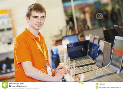 Seller at computer store stock image. Image of happy - 41006691