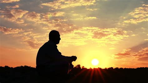 Sitting Meditating Man Prayer At Top Red Sunrise Sunset 4k