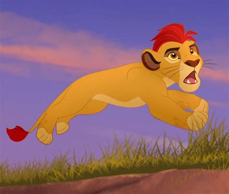 The Lion King Is Running Through The Grass