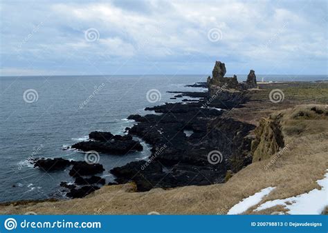 Coastal Seascape Of Londrangar Rock Formation In Iceland Stock Image