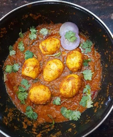 Add the red curry paste and kaffir lime leaves (not shown in photo) and stir fry for about 30 seconds. Egg Curry Recipe - Teja's Recipes