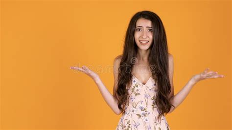 Confused And Puzzled Young Woman Rising Her Hands Up Stock Footage