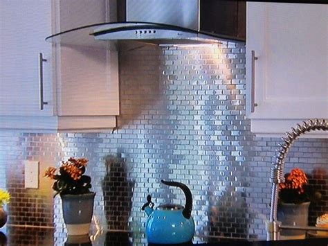 Integrated of living spaces beds. Tin Backsplash on Property Brothers | Tin tile backsplash ...