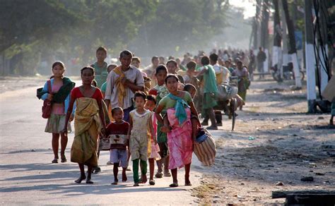 Photos In Village Worst Hit By Assam Violence Houses Burn Hundreds Flee India News Firstpost