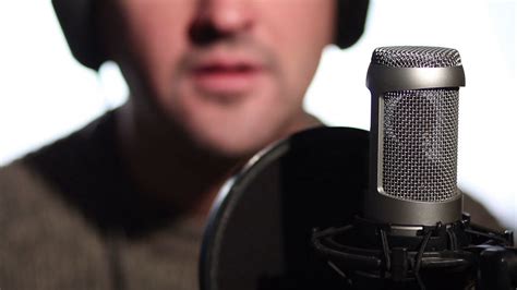 Close up man singing into a condenser microphone Stock ...