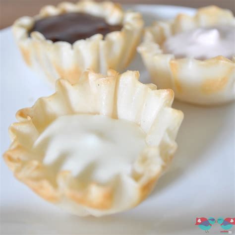 A light dessert idea that's easy enough for i could eat the cream cheese filling with a spoon! Phyllo Cup Dessert Recipe - The Love Nerds