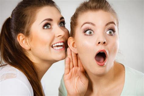 Two Women Telling Gossip Stock Photo Image Of Whispering 94496508