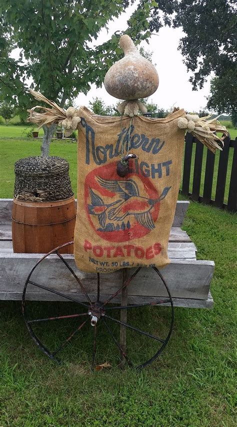From scary to funny, they are clever garden decor. Ann Shanks - Cute scarecrow! | Fall outdoor decor, Fall ...