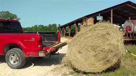Unloading Hay Bale From Truck Youtube
