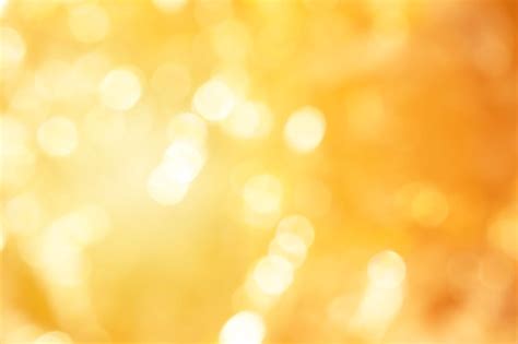 Premium Photo Gold Abstract Bokeh Background Abstract Golden Glare On