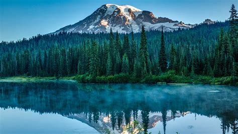 Snow Capped Mountain Surrounded With Trees Near Body Of Water With Reflection K Hd Nature