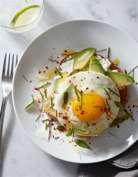 Avocado Toast With Herbed Goat Cheese And Fried Egg