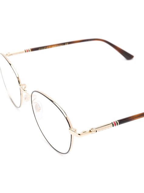 gucci eyewear web detail round frame glasses farfetch