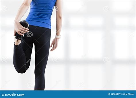 Young Woman Stretching Legs Before Yoga Fitness Exercise Copy Sp Stock