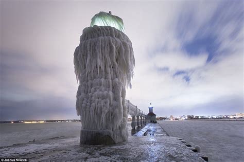 Frozen Lake Michigan Lighthouse Transforms Into Stunning Ice Castle