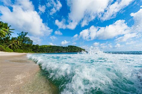 Indian Ocean Waves Spray And Beach In Background Seychelles Mahe