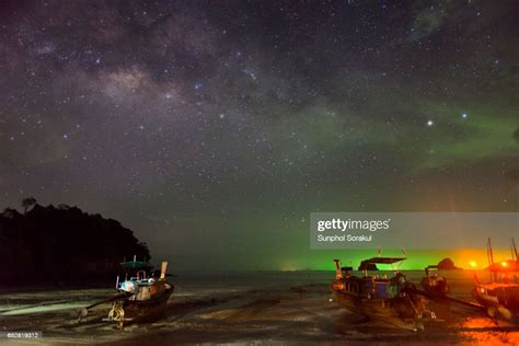 Longtail Boats On The Beach At Night With Milky Way In The Sky High Res