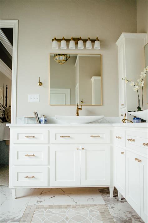Contemporary White Master Bathroom With Marble And Gold Fixtures And