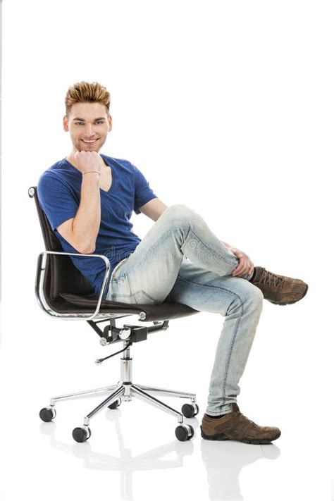 Young Man Sitting On A Chair Stock Image Image Of Beautiful Creative