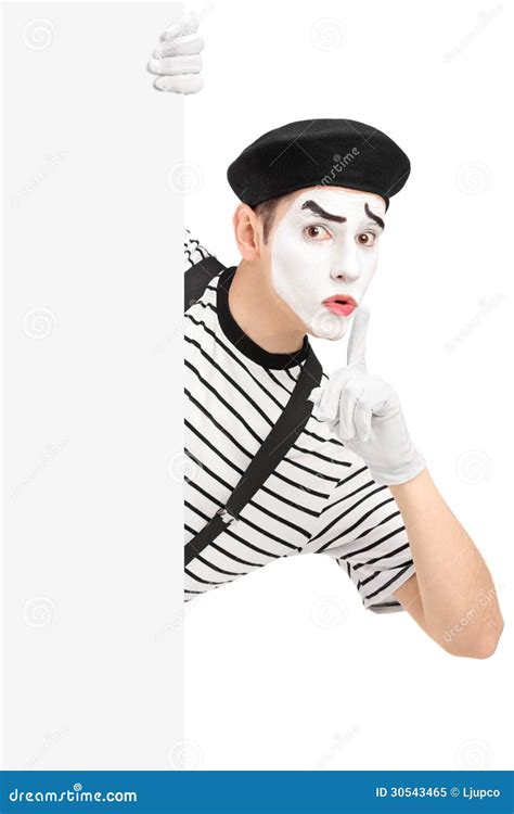 Male Mime Artist Holding A Blank Panel And Gesturing Silence Wit Stock