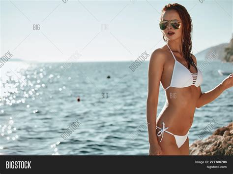 bikini girl on beach image and photo free trial bigstock