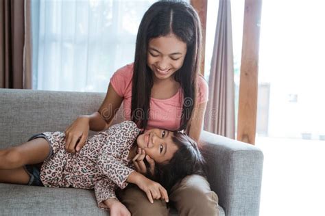 Asian Cute Happy Sibling Sister Smiling Stock Image Image Of Couch