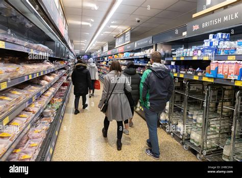 Aldi Supermarket Uk People Shopping In An Aldi Supermarket Aisle Aldi