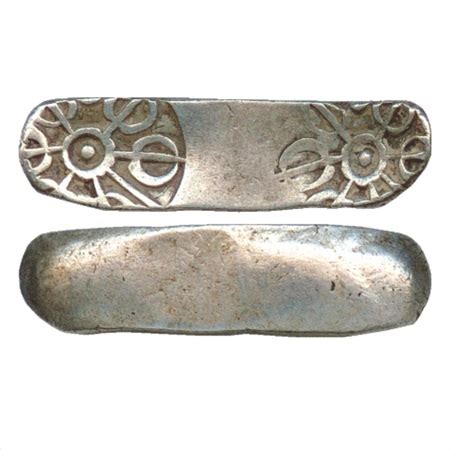 One more of these very early taxila shatamana bent bar coins, seen from all angles (length 11.3mm / 0.44 inches; Classical Numismatic Gallery