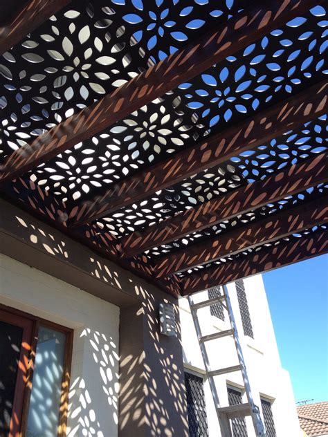 The project features a patio in a midcentury home in des moines, iowa that was fashioned into a second living room. Roof screen on pergola to front door. Great shadowing effect :) (With images) | Outdoor pergola ...
