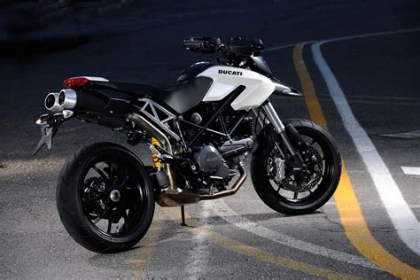 It's a deal cheaper too and ducati says it will return 58.9mph, which makes it. 2012 Ducati Hypermotard 796 Review