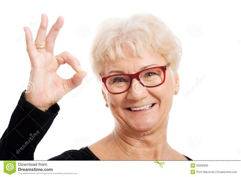Happy Old Woman In Eye Glasses Showing Ok Royalty Free