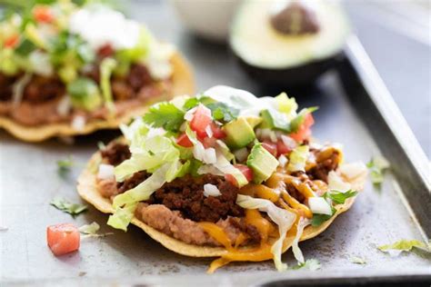 Tostada literally means toasted and usually we use the word to refer to dishes made on crispy fried flat tortillas. Beef Tostadas | Recipe in 2020 | Tostada recipe beef, Beef recipes, Beef dishes
