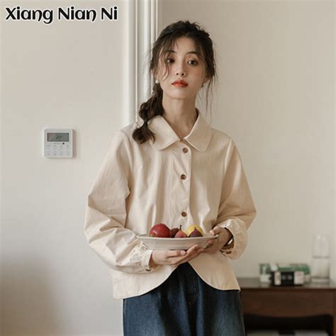 Xiang Nian Ni เสื้อคอยาวแขนเสื้อโปโลผู้หญิงเสื้อเอวลอยทรงหลวมเข้ารูป