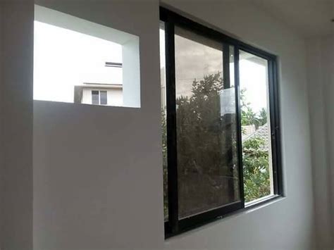 Can be installed under the door frame or frontally mounted onto the wall. Sliding Window Installation Service Cebu - Cebu Image