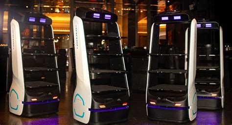 A Futuristic Hot Pot Restaurant Featuring Robot Servers And 5d