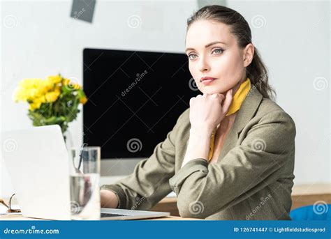 Attractive Businesswoman Using Laptop While Sitting Stock Image Image