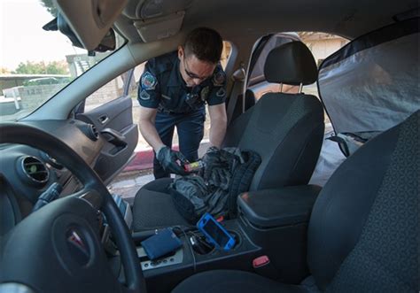 police to enter private unlocked vehicles and take valuables to remind locals to lock up new
