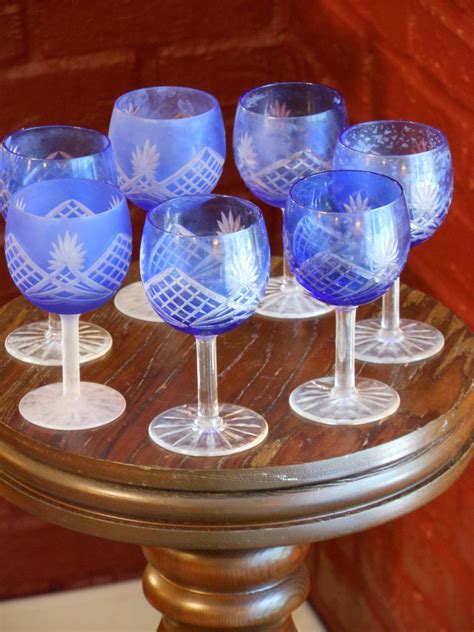 Seven Blue Glass Etched Frosted Aperitif Glasses