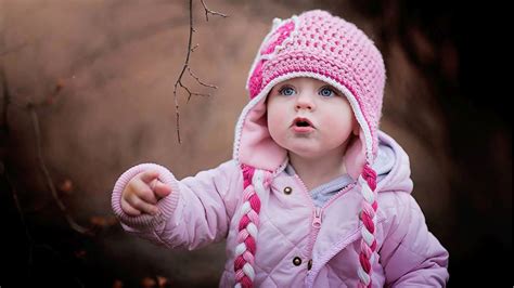 2560x1440 Resolution Cute Baby In Winter 1440p Resolution Wallpaper