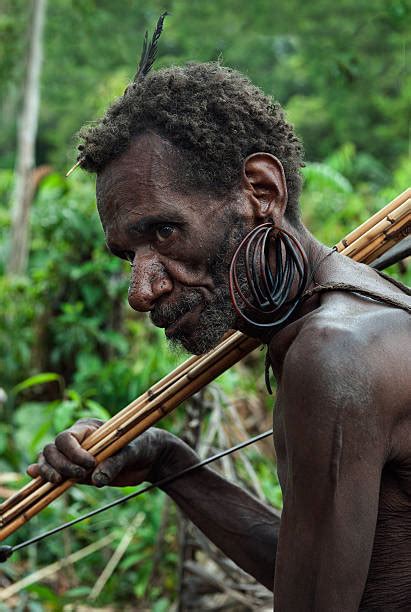 Korowai People Stock Photos Pictures And Royalty Free Images Istock