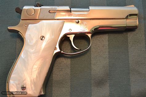 Smith And Wesson 39 2 Semi Auto 9mm Pistol In Nickel Finish With Pearl