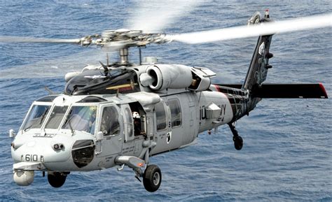 Mh 60 Seahawk Of Us Navy Hovering