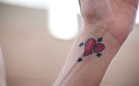 Tattoos Of Broken Hearts › Wrist Tattoos Of Broken Hearts