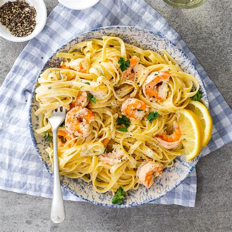 Don't let the short ingredient list fool you, this tastes so good! Creamy lemon garlic shrimp pasta - Simply Delicious