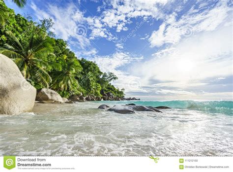 Paradise Tropical Beach With Rockspalm Trees And Turquoise Water In Sunshine Seychelles 38
