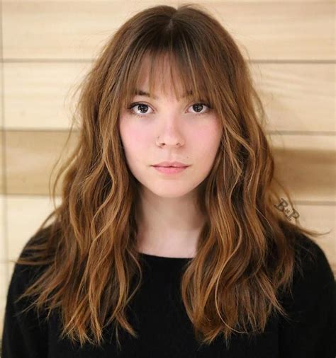 Long Wavy Hairstyle With Straight Bangs Straight Bangs Long Hair With