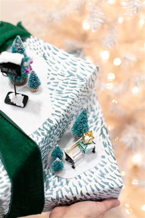 Paper snowflakes give these gifts a unique handmade look that's easy to recreate. Holiday Gift Wrapping idea with Miniature Winter Scenes ...