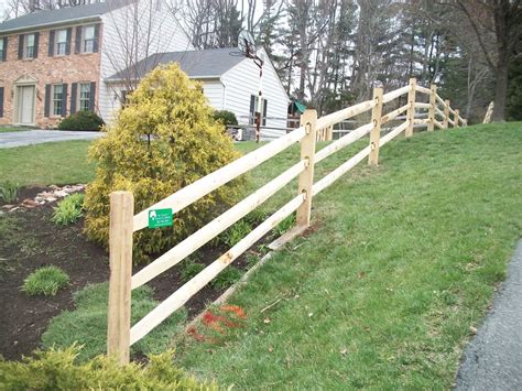 I'll admit i'd never installed a fence before. Split Rail Fencing - Rustic - Landscape - DC Metro - by Tri County Fence & Decks